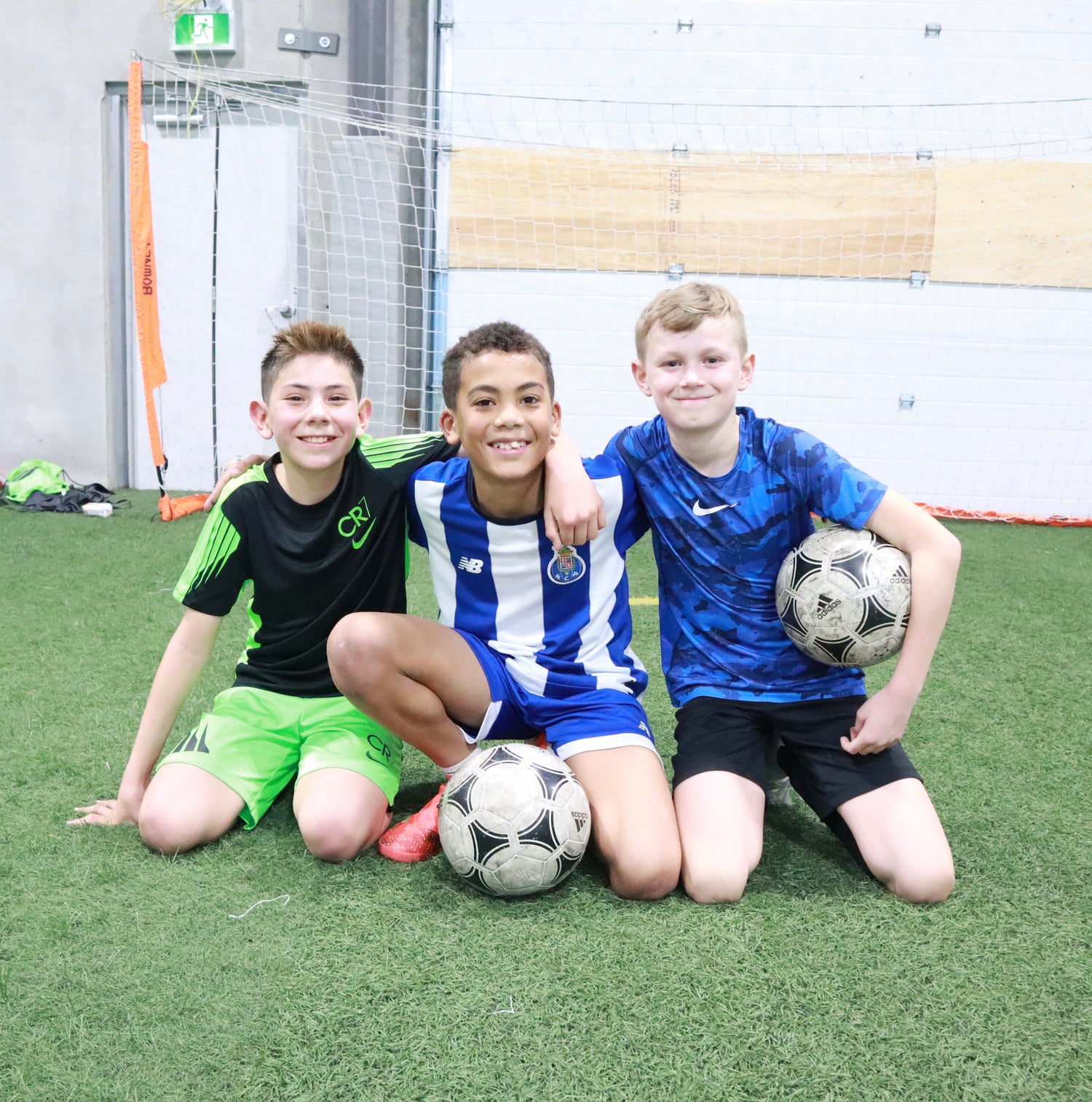Optimal Soccer Training young clients during a session.